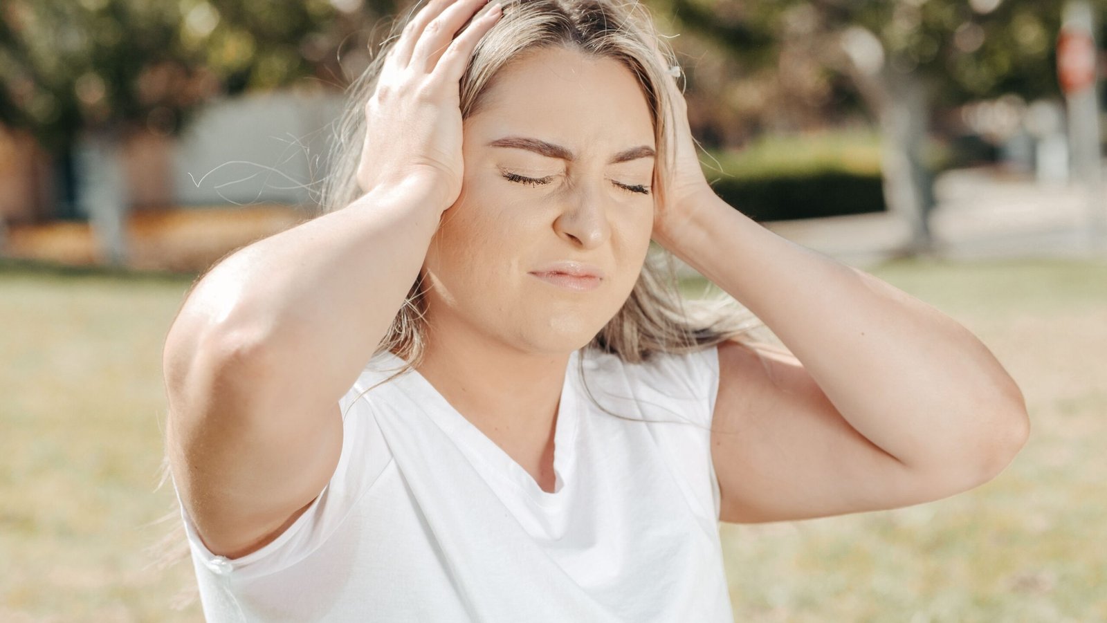 Woman Bracing Against Dizziness